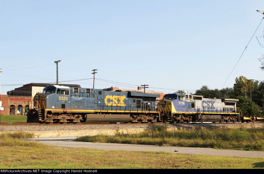 CSX 5325 & 7778 lead train lead train Q439-26 out of the yard